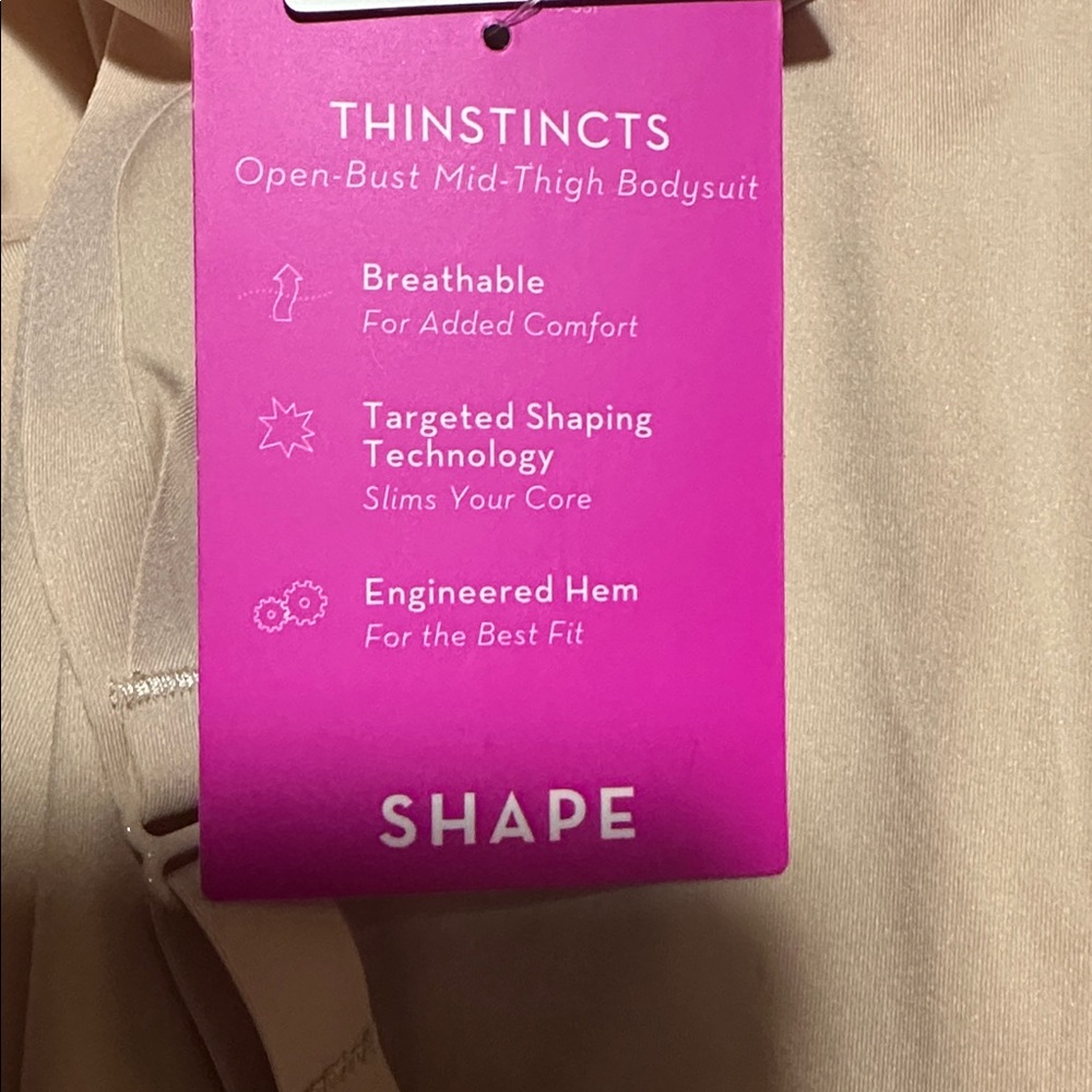 Spanx NWT
NWT SPANXsculpt™ THINSTINCTS Open-Bust Mid-Thigh Bodysuit - Picture 5 of 8